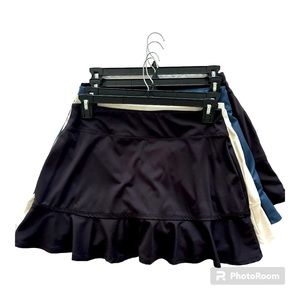 Four Tommy Bahama golf skirts - large